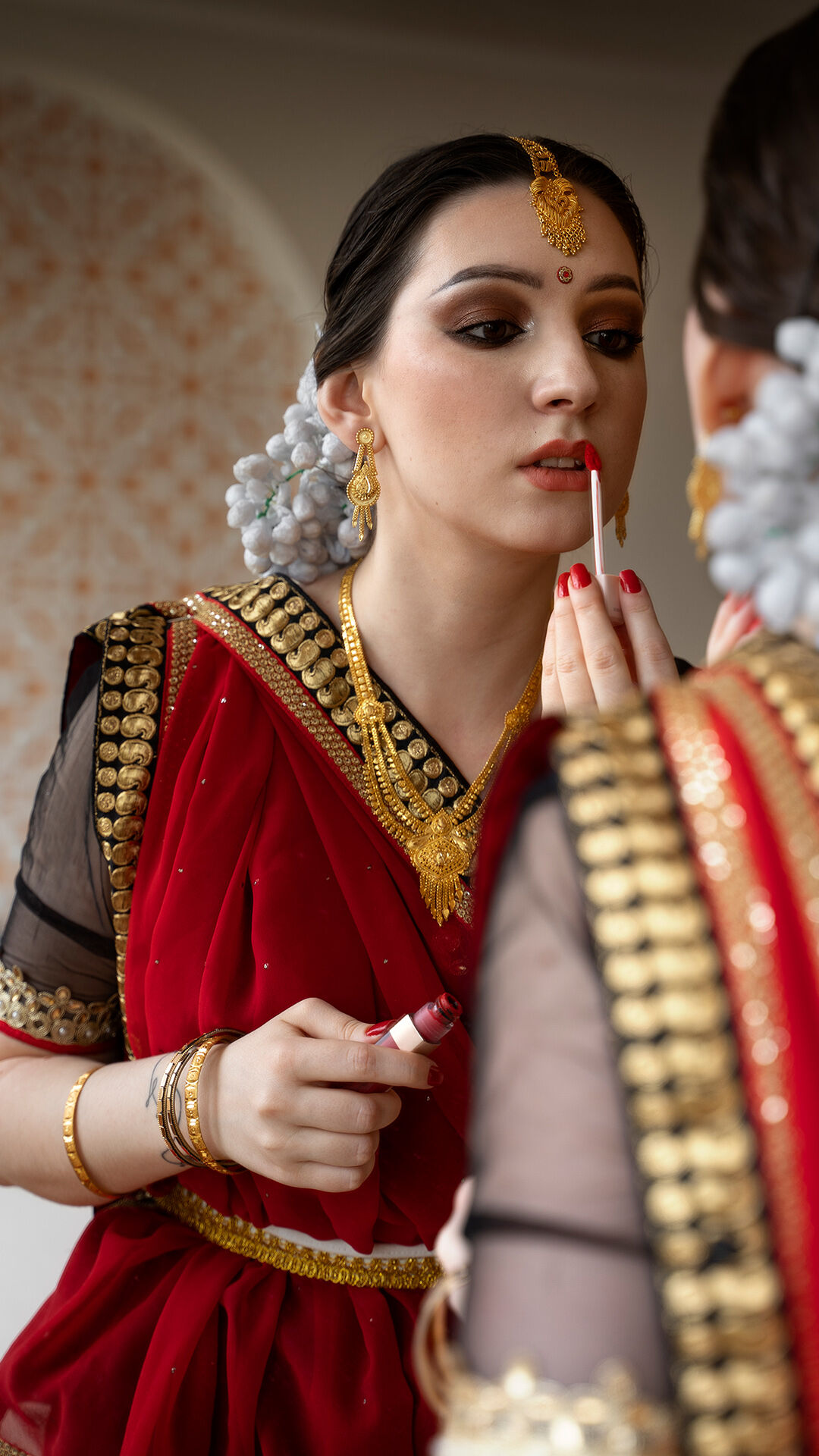 A girl getting her makeup done by a professional